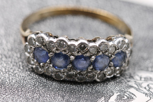 Gold Ring set with band of 5 Sapphires bordered by 24 Diamonds