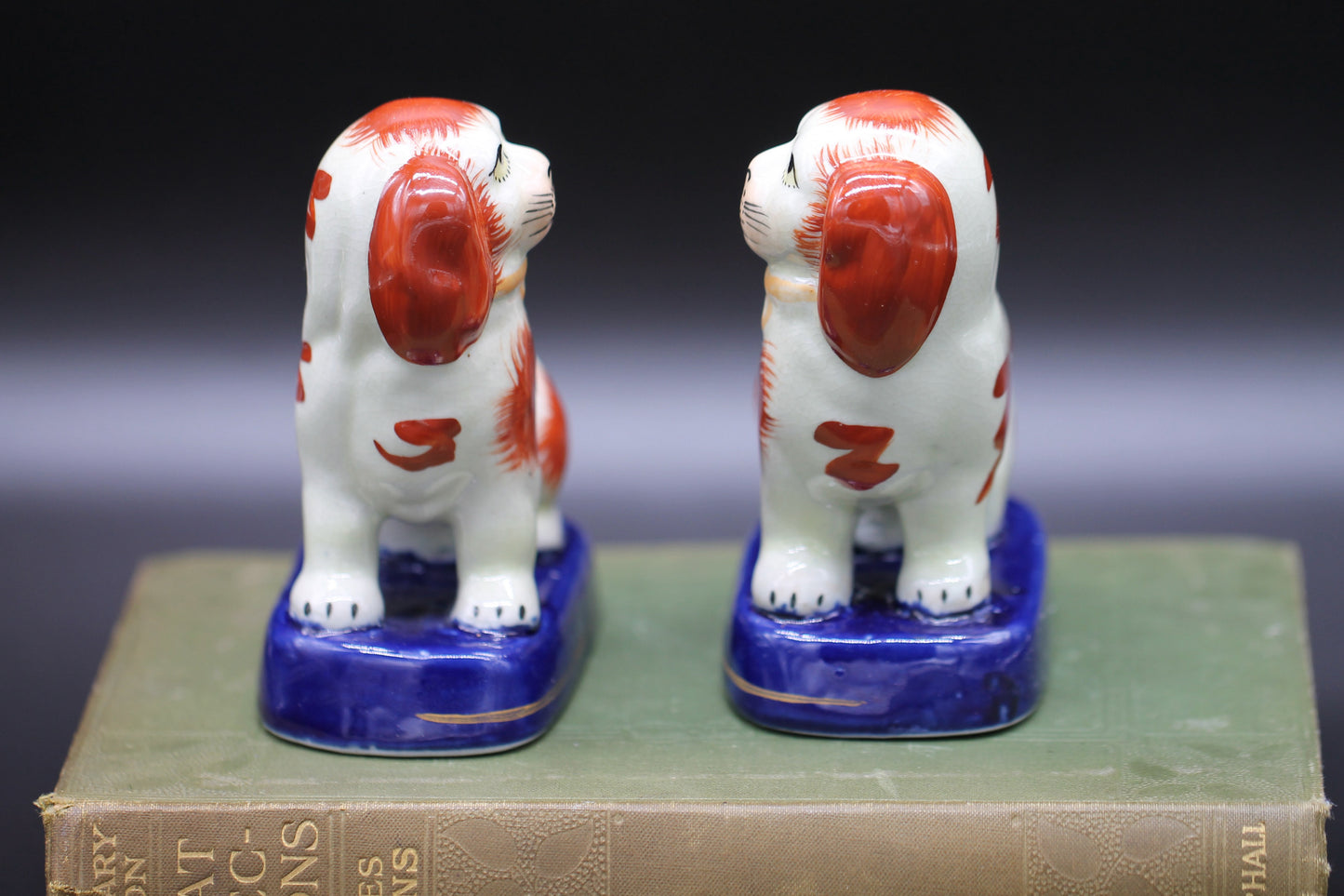 Miniature Staffordshire Pottery Figures of Russett Spaniel Dogs on Blue Bases c1900