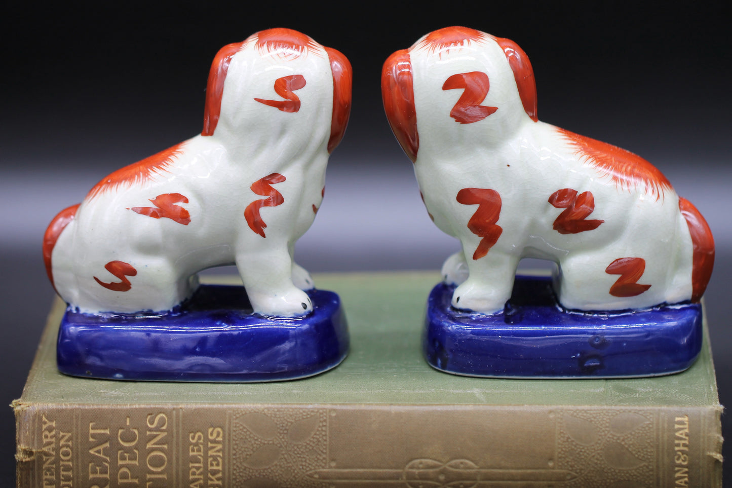 Miniature Staffordshire Pottery Figures of Russett Spaniel Dogs on Blue Bases c1900