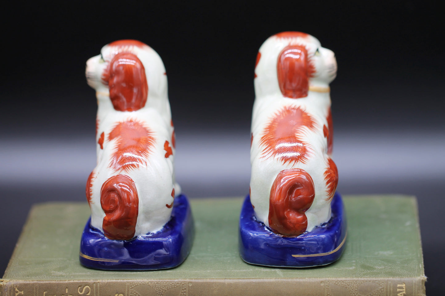 Miniature Staffordshire Pottery Figures of Russett Spaniel Dogs on Blue Bases c1900